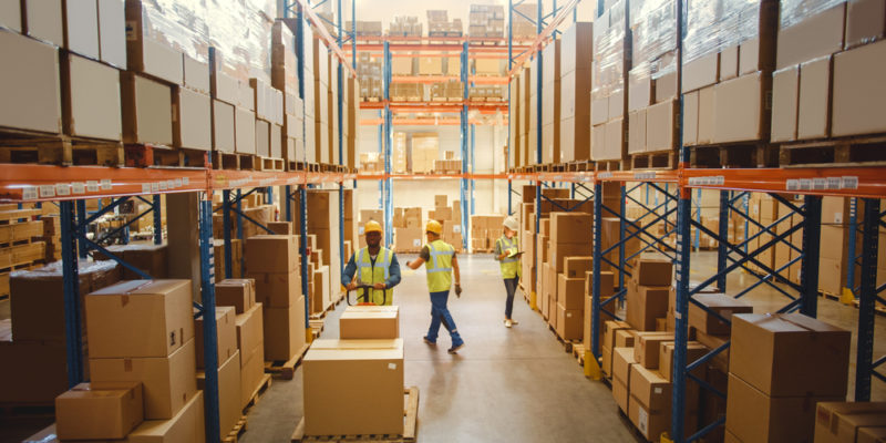 Retail,Warehouse,Full,Of,Shelves,With,Goods,In,Cardboard,Boxes,